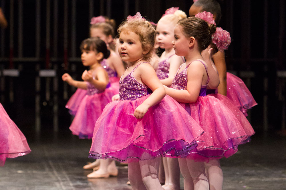 Three year old, pre-ballet dancers, called KinderKapers, take the stage at the Sharon Davis School of Dance recital in Tallahassee.